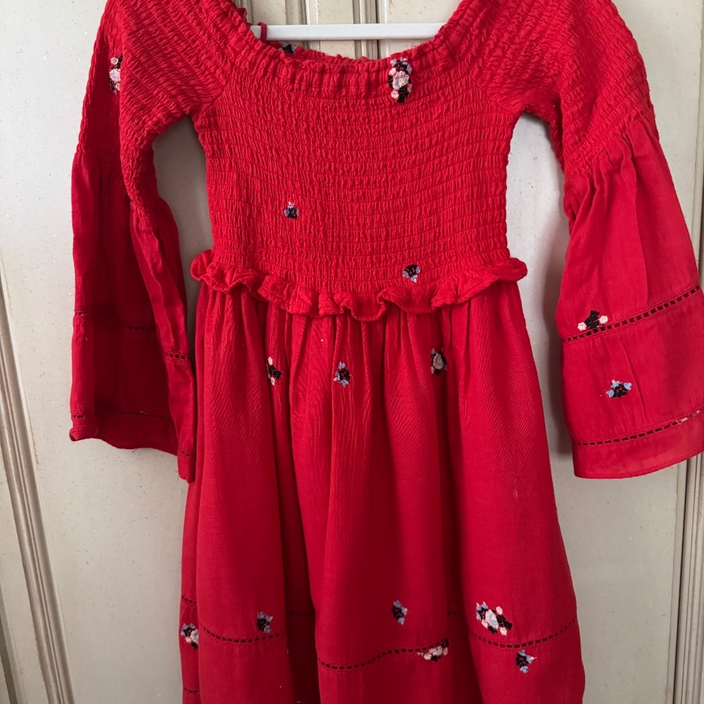Red peasant style dress by Free People. Size XS